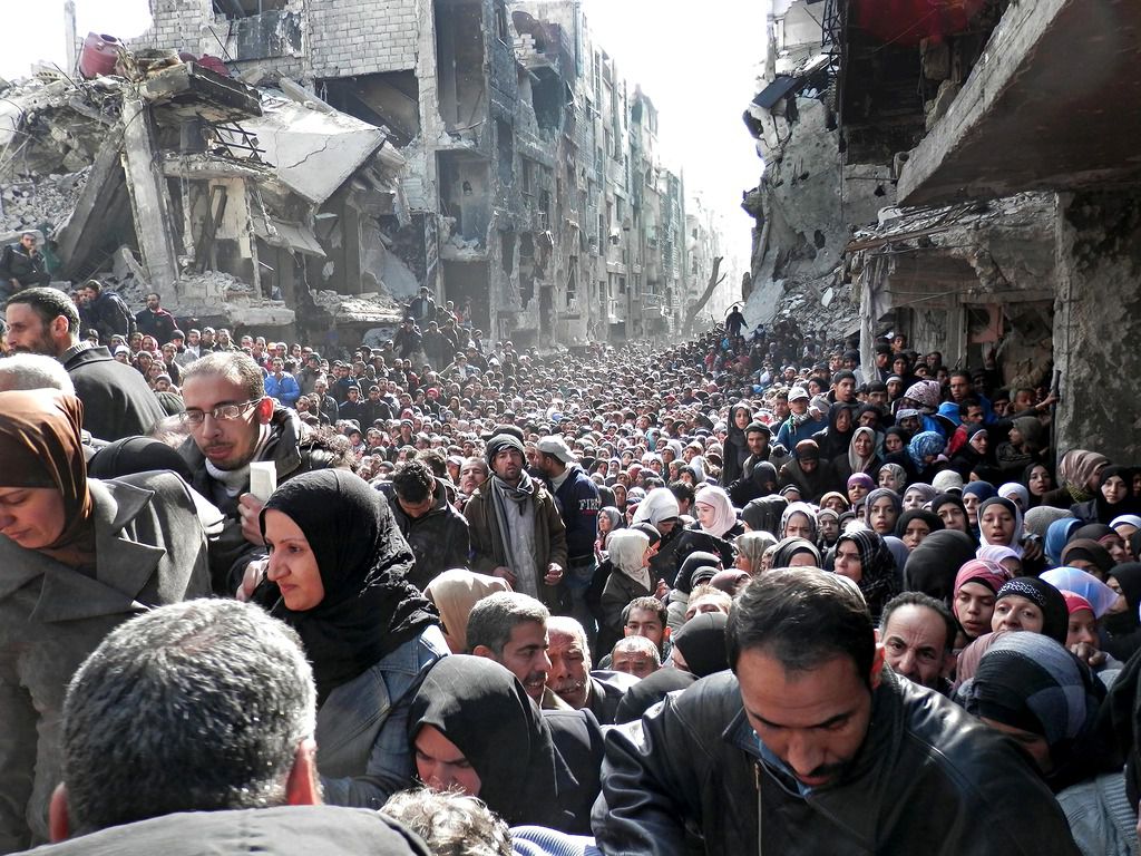 The Queue for Food at a Syrian Refugee Camp
