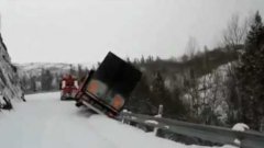 Tow Truck Driver Jumps Out Of Truck As It Falls Off Cliff