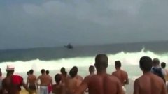 Helicopter crashes into beach