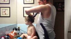 Dad uses vacuum to give daughter perfect ponytail