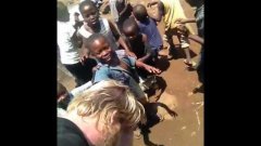 African kids and white guy