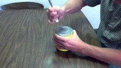 How to open a can with a spoon
