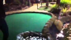 Golf Ball Floating On Water Stream Shot