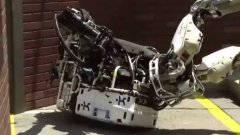 Robots Falling Down at DARPA Robotics Challenge