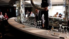 Bartender Pours Twelve Multi Color Cocktails At Once