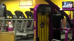 Girl Dances While Walking On Treadmill