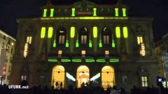 Pinball Game Light Show Projected Onto Building