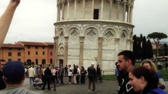High-Fiving People At The Leaning Tower Of Pisa