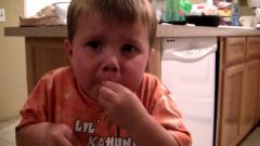 3 year old eating atomic warhead candy