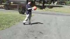 Over-inflated basketball explodes when bounced