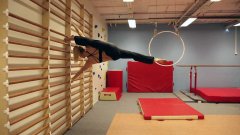 Pole dancer performs 24 hardcore strength, flex moves