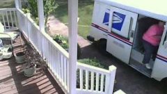 Lazy USPS worker delivers package driving onto the lawn