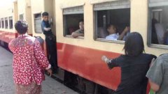 Running Boarding Onto Moving Train In Myanmar