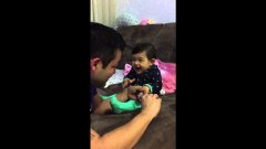 Adorable Baby Fakes Crying When Daddy Tries To Cut Her Fingernails