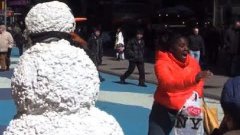 Snowman Scares People In Times Square
