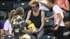 Fan Catches Foul Ball In Popcorn Bucket