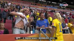 Fan changes shirt with woman football player