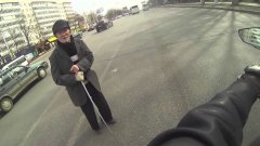 Motorcyclist Helps and old man cross the road