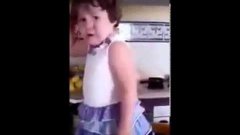 Crying toddler immediately strikes pose when she sees camera