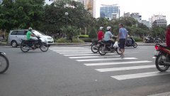 Crossing Busy Street In Vietnam